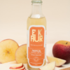 Bottle of Tropical Apple Jack with fruits